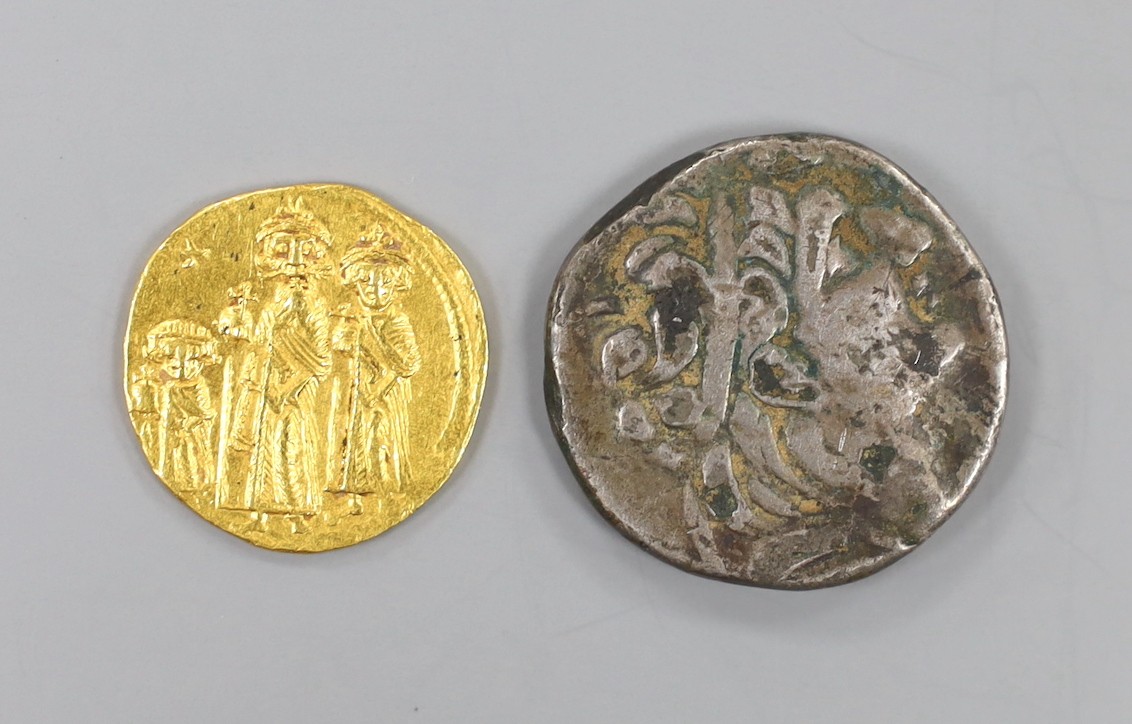 A Heraclius gold solidus, 610-641 AD, 4.4 grams and a silver Tetradrachm, 12.4g